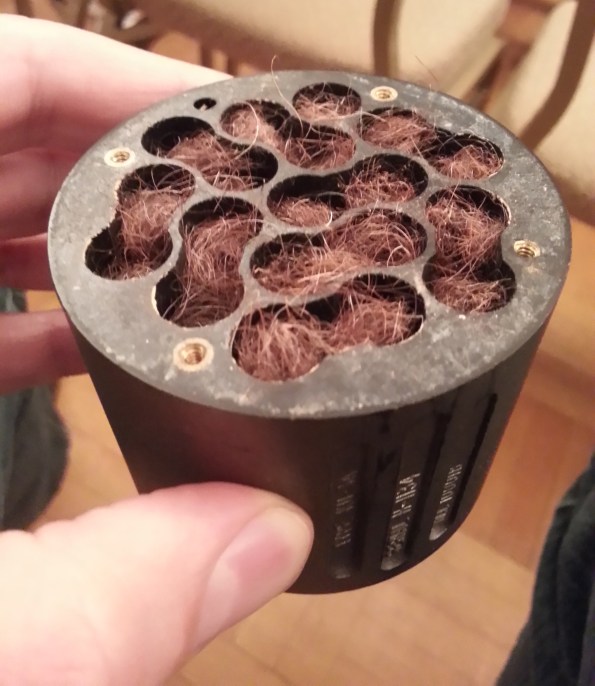The internal labyrinth of the RCA KU-3a or 10001 ribbon microphone featuring absorption with curly cow hair